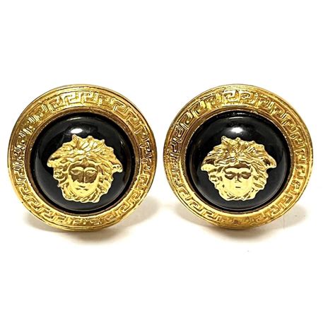 boucle d'oreille en or versace ondulée|Versace .